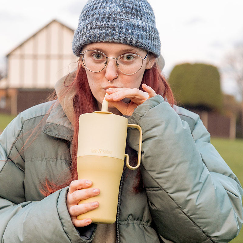 26oz-rise-tumbler-with-straw-lid-p0 26oz_rise_rumbler_straw_wax_yellow_woman_sip_square.jpg