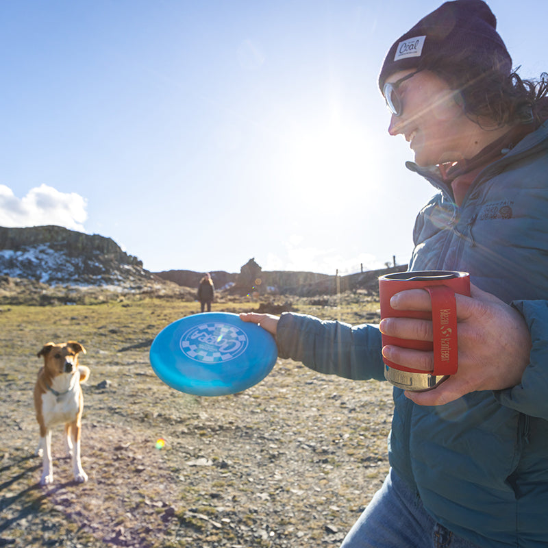 12oz-camp-mug-p4 insulated_camp_mug_12oz_woman_dog_frisbee_square.jpg