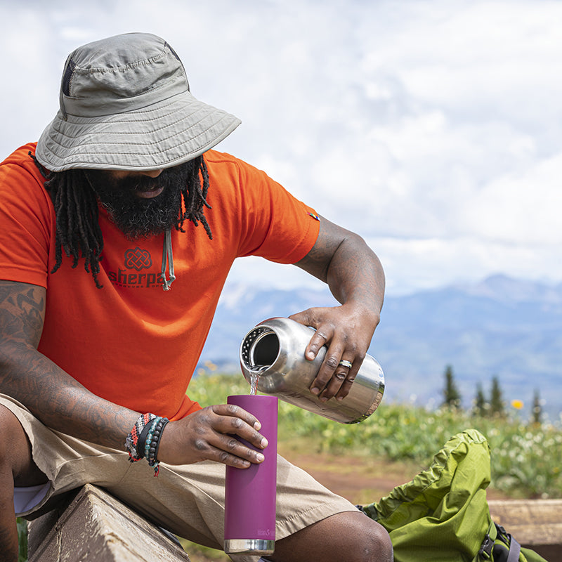 64oz-tkwide-with-loop-cap-c5 tkwide_64oz_bottle_backpacker_mountains_filling_square.jpg