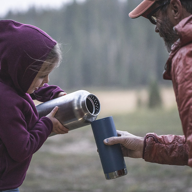 64oz-tkwide-with-loop-cap-c5 tkwide_64oz_bottle_girl_dad_filling_square.jpg